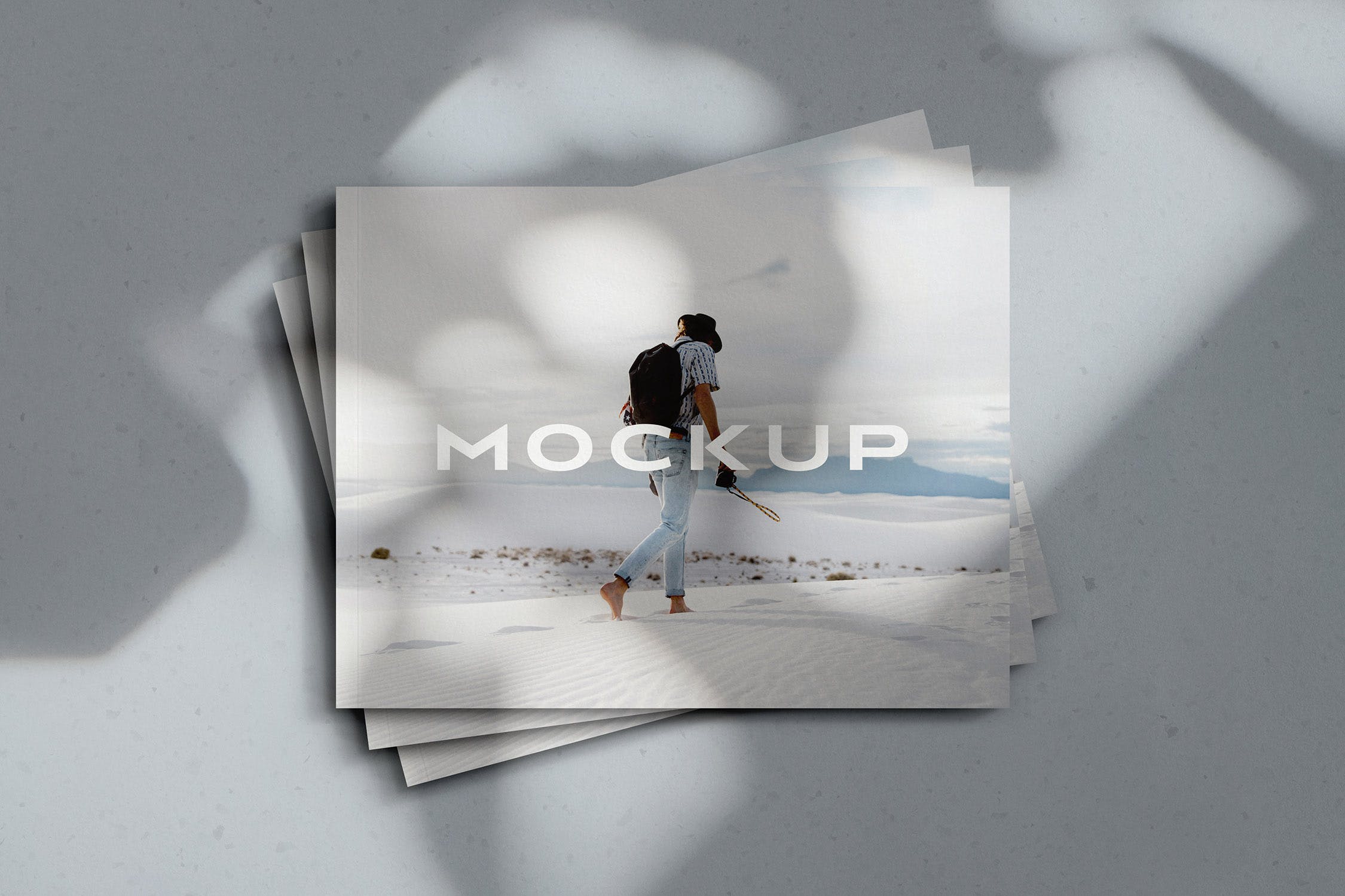 堆叠的横版杂志封面设计样机素材 Stacked Landscape Magazines Mockup
